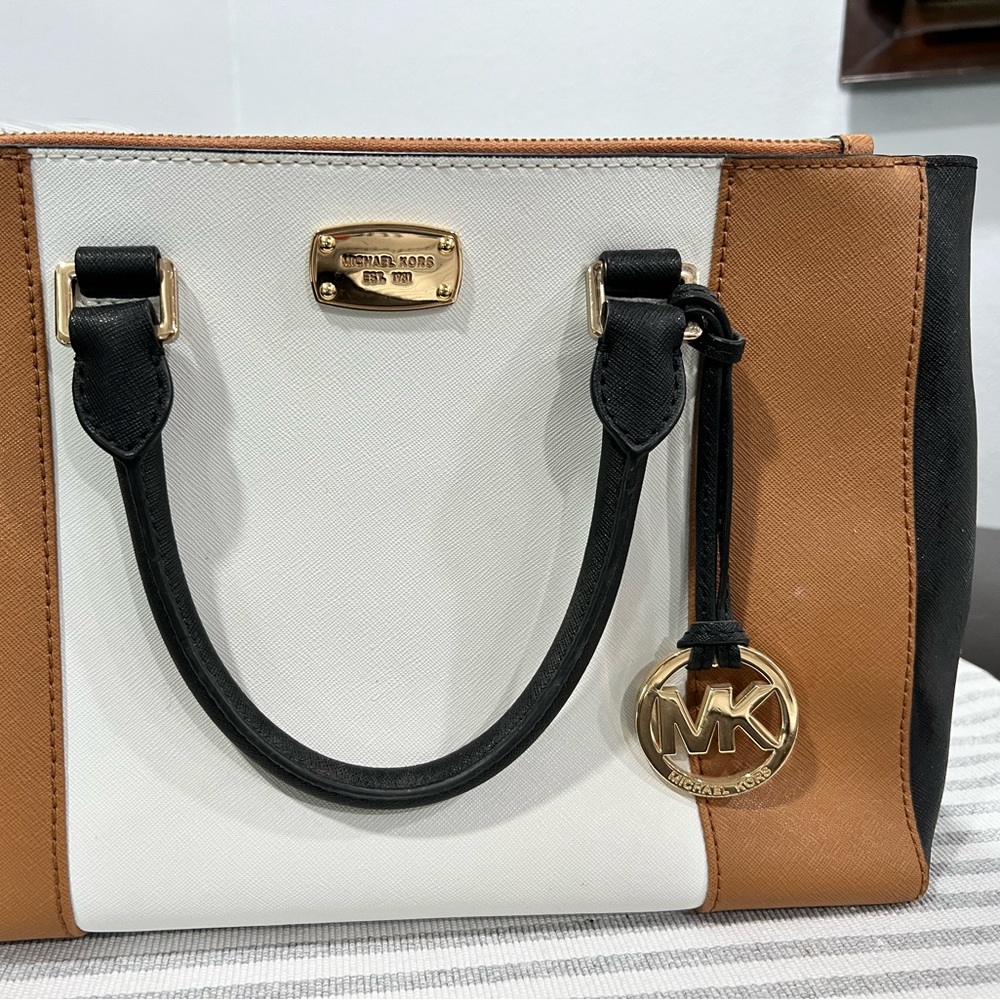 Michael Kors purse black/white/brown color.